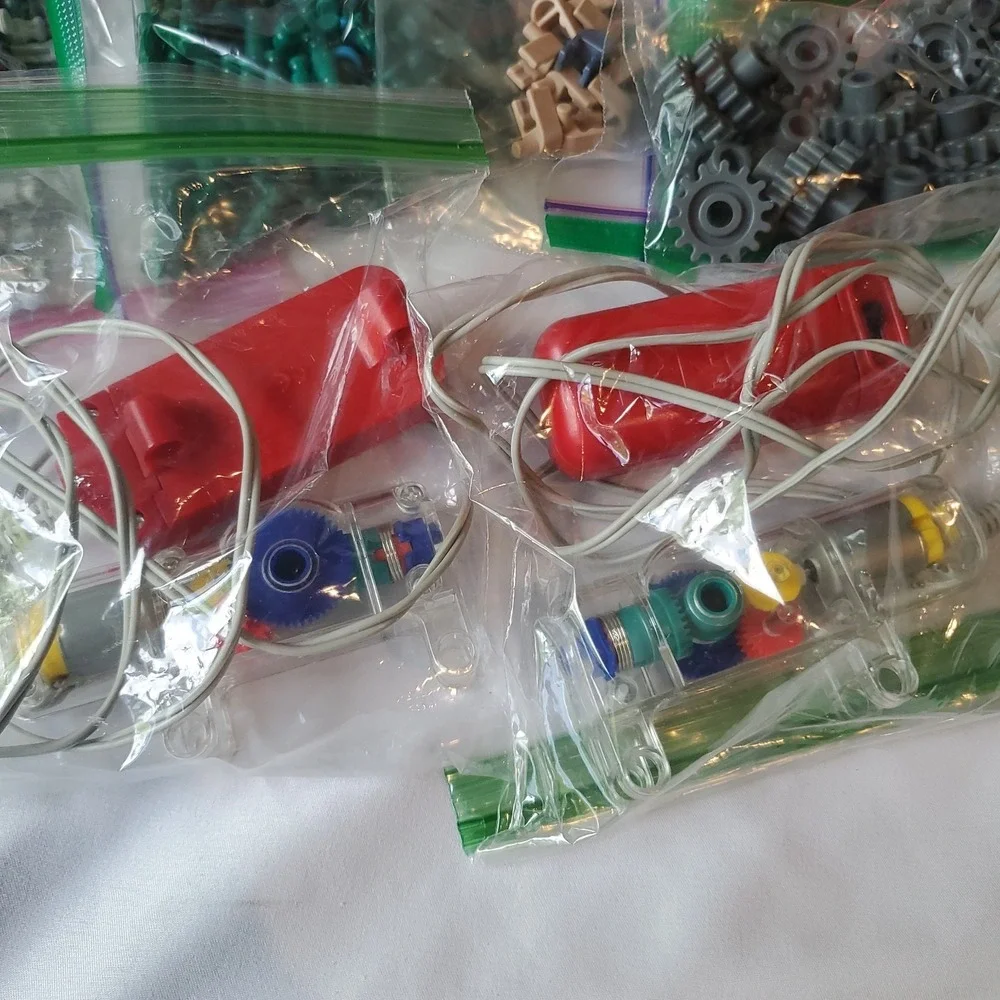 K'NEX Mixed Lot With Orange Case, Power Packs, Wheels, Instructions + More READ
